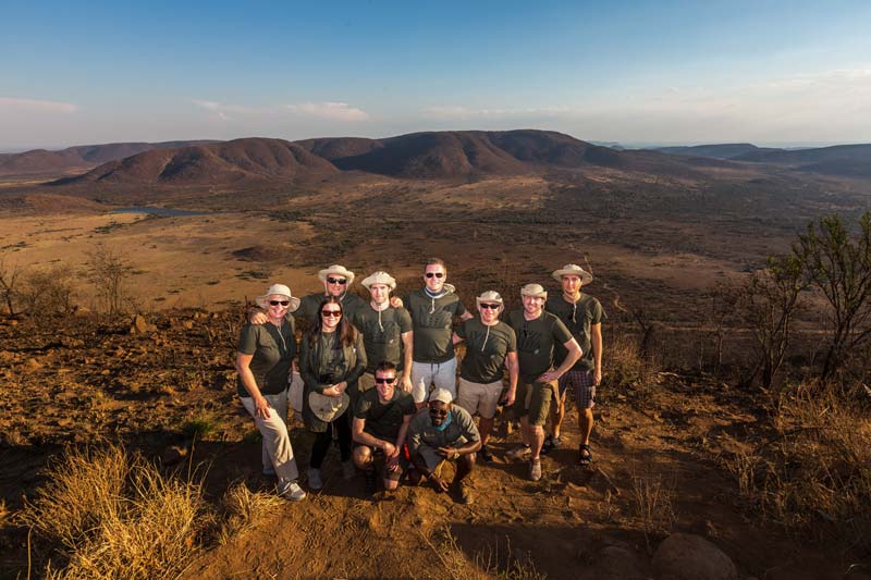 group photo on foot in the bush